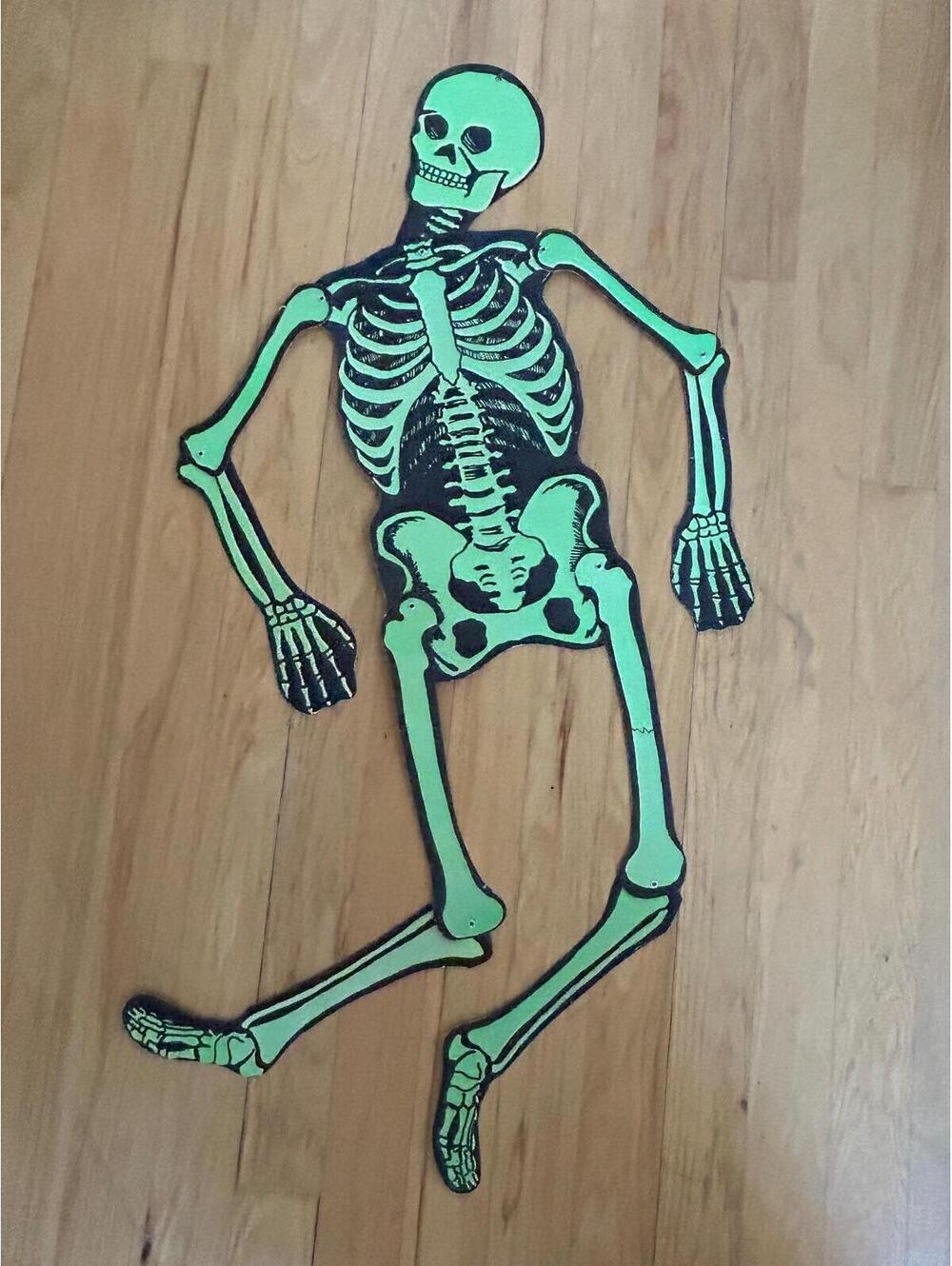 Vtg. articulated cardboard hanging 51” skeleton scary halloween die cut.